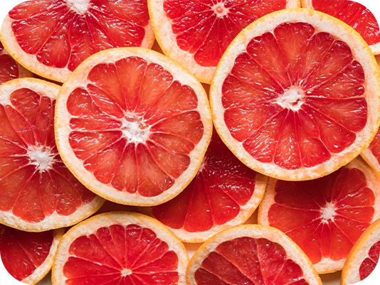 Sliced pink grapefruit, fresh citrus top note